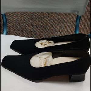 Stuart Weitzman low-heeled black dress shoes